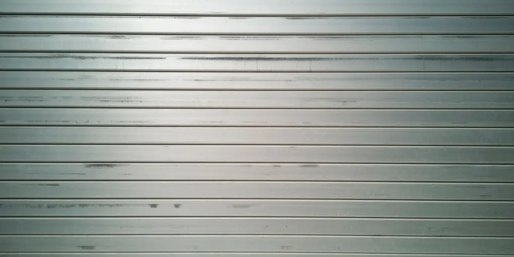 How to Fix a Dented Garage Door Panel